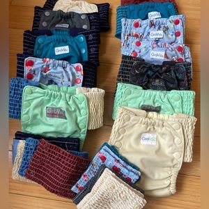 12 Grovia cloth training pants with additional extender side panels. Barely used